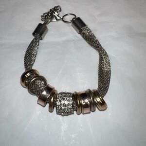 Mesh Twisted Silver Tone Bracelet With Barrel Charms